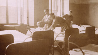 Deacons providing care in Megiddo House, 1926