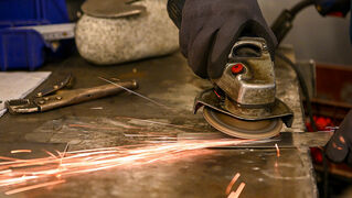 Sparks fly during angle grinding.