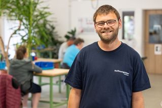 Patrick Engel guckt freundlich in die Kamera 