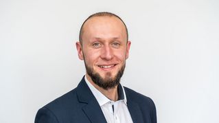 Prof. Dr. Markus Schmidt lächelt in die Kamera.