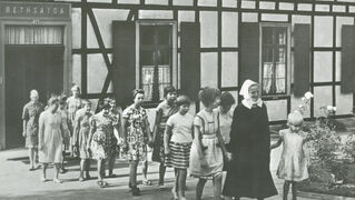 Deaconesses with children from Bethsaida House, late 1950s